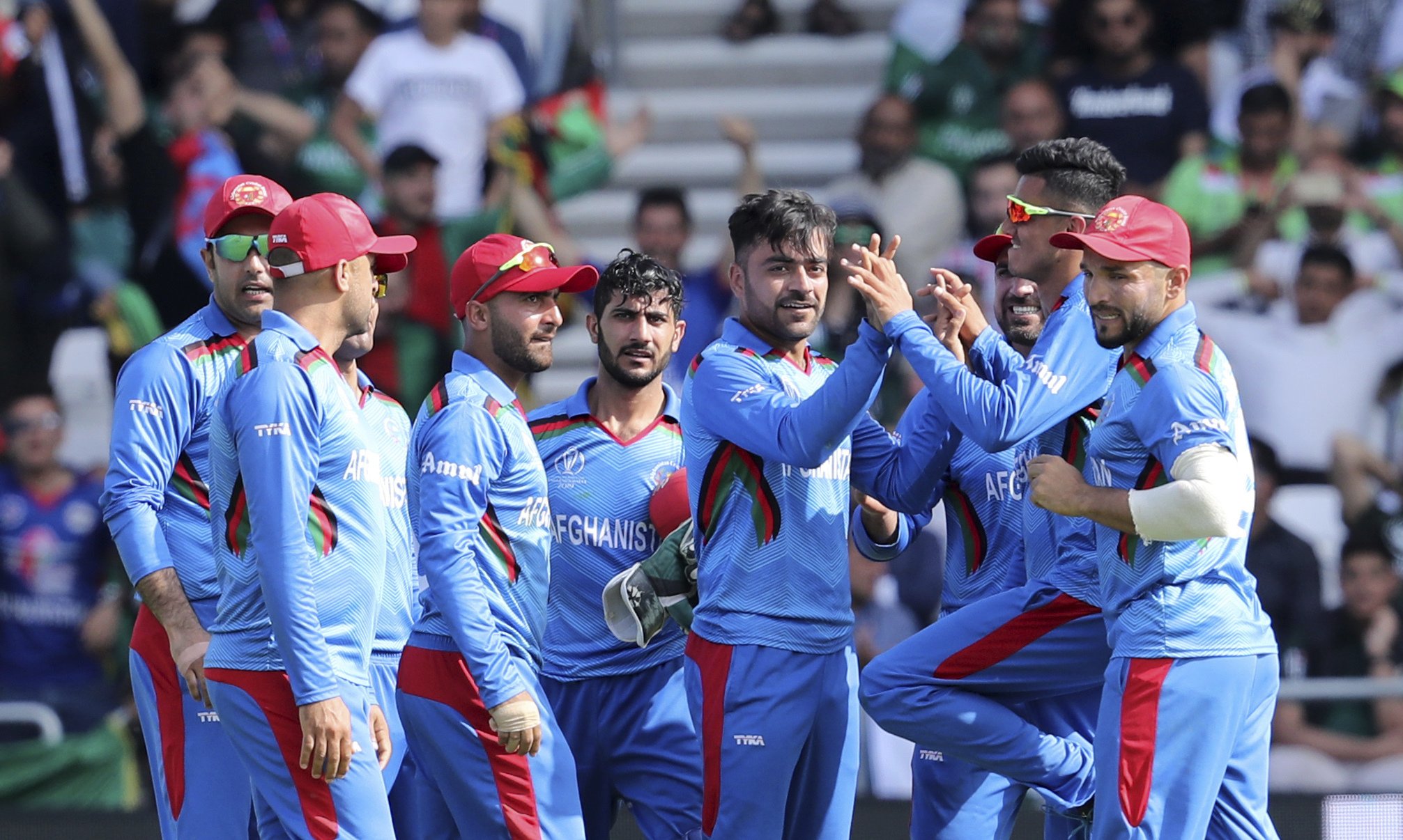 Rashid khan with afganistan cricket team