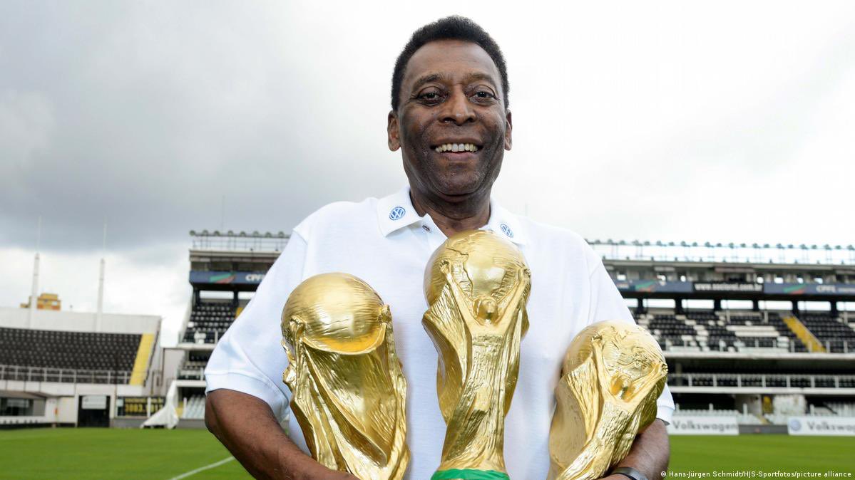 PELE with trophy